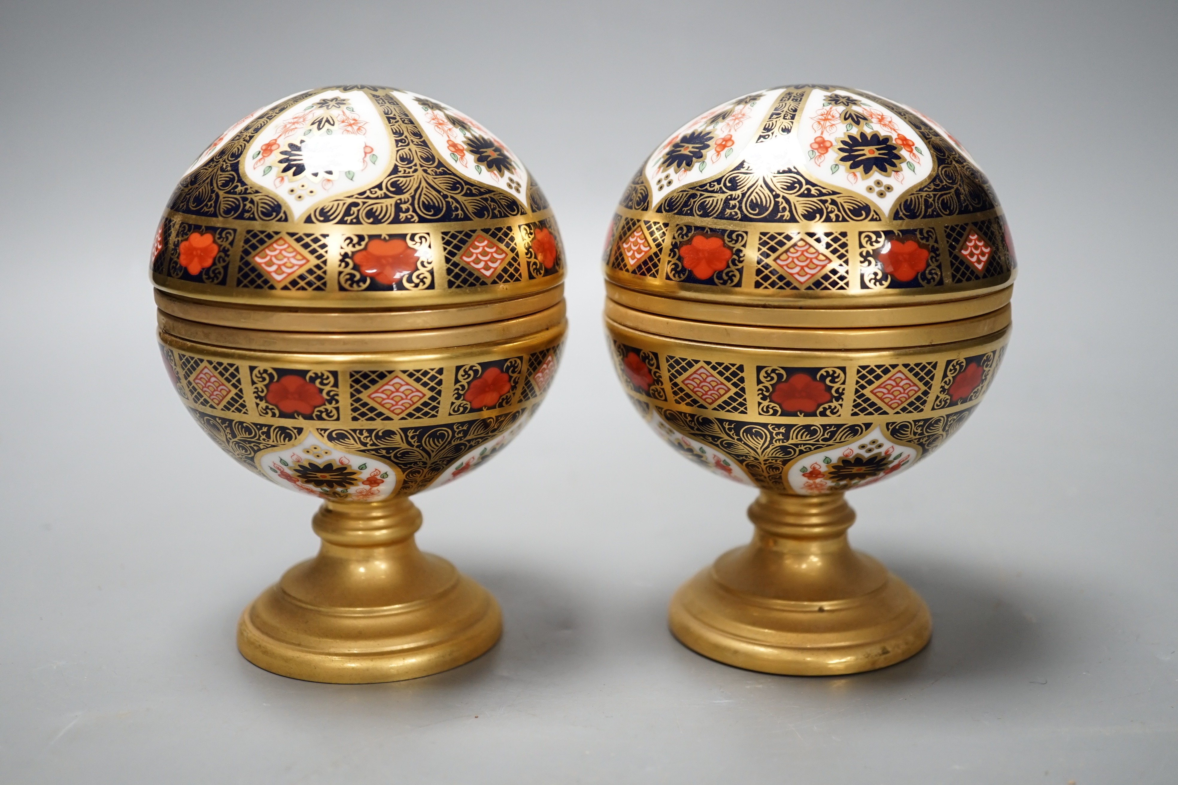 A Royal Crown Derby Millennium globe thermometer and a Millennium globe aneroid barometer, 13cms high